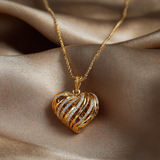 Cuore Intrecciato Necklace – Cuore di Luce – Luminous openwork heart ✨ Cuore Intrecciato — 18K gold vermeil pendant with sparkling zirconia. A signature Cuore di Luce design