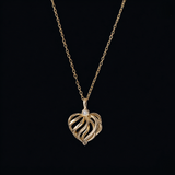 Cuore di Vento Necklace — Cuore di Luce – Airy golden elegance ✨ Cuore di Vento — openwork 18K vermeil heart pendant with central zircon. A signature Cuore di Luce piece