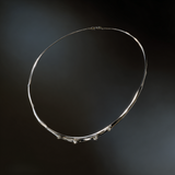 Luna Lineare Necklace – Cuore di Luce – Moonlit minimalism ✨ Luna Lineare — a sculptural rhodium-plated silver necklace with star-like zircon accents