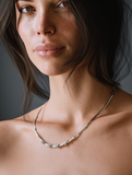 Luna Lineare Necklace – Cuore di Luce – Moonlit minimalism ✨ Luna Lineare — a sculptural rhodium-plated silver necklace with star-like zircon accents