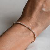 Arm close-up with gold vermeil bracelet — Luce Sottile Tennis Bracelet