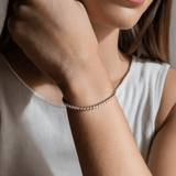 Model showcasing Luce Sottile Tennis Bracelet — Italian-inspired gold jewelry